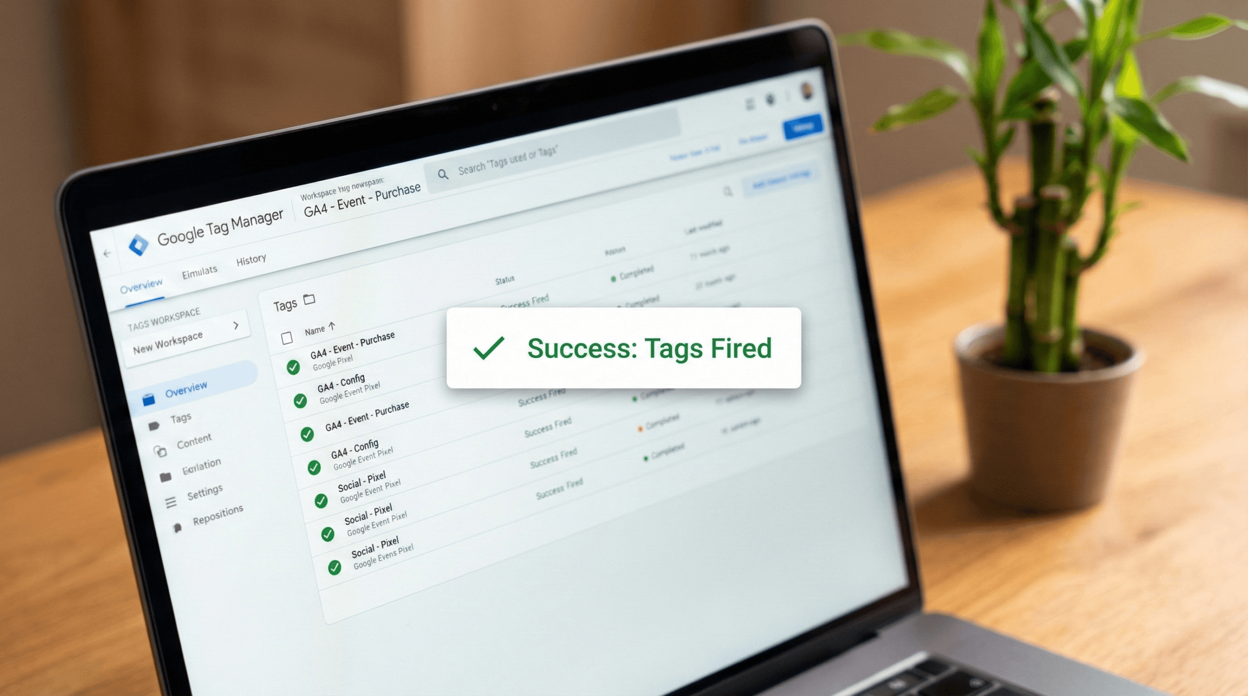 Laptop screen displaying a Google Tag Manager workspace with a 'Success: Tags Fired' overlay, confirming active GA4 and social tags. A bamboo plant sits in the background on a wooden desk, representing Bambú Studio's clean data approach.